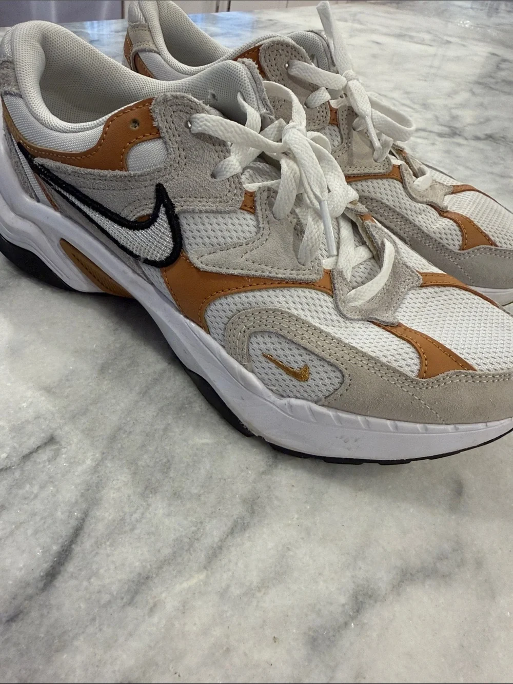 The Nike Tech Hera in Light Orewood